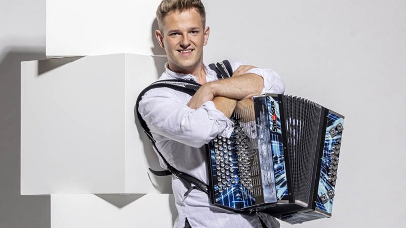 Ein junger Musiker mit Mundharmonika. | © Silvretta Montafon