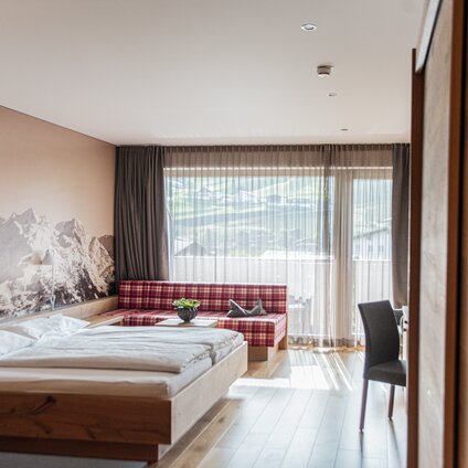 sporthotel_silvretta_montafon_junior_suite_lichtdurchflutetes_helles_hotelzimmer | © Silvretta Montafon - Mara Baues